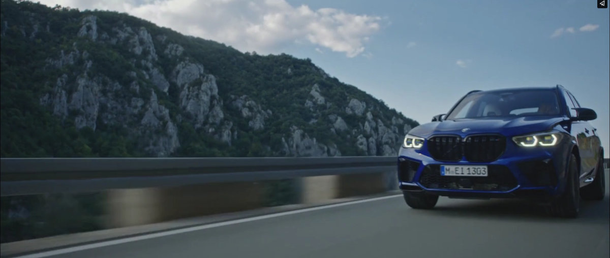 BMW X6 M on a mountain road, from a Focused Production shoot