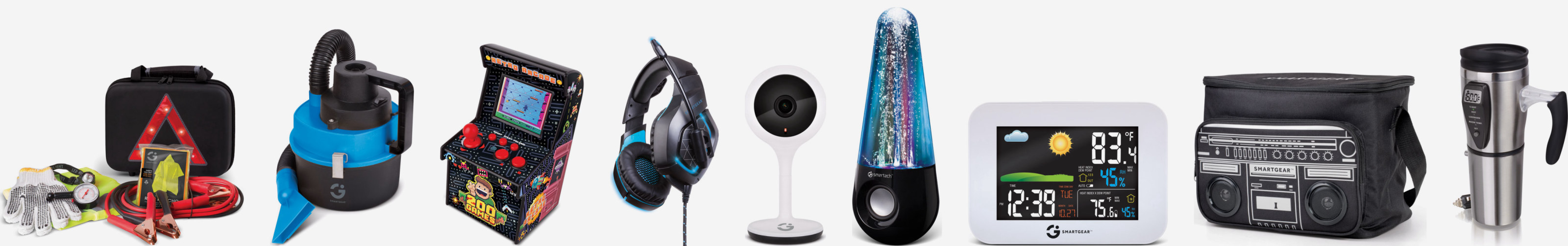 JLR Gear products in a row: a roadside emergency kit, a wet and dry vacuum, a mini arcade, a gaming headset, a smart camera, a light-up speaker, a weather station, a boombox cooler bag and a heated mug