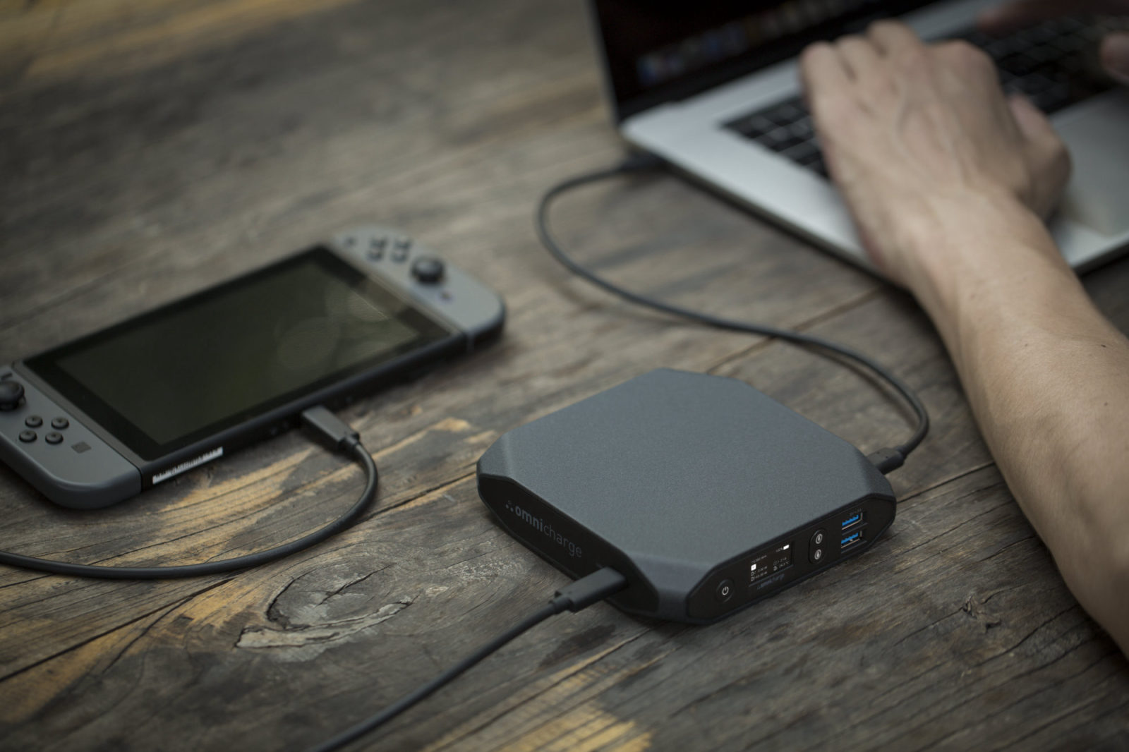 Omni with a game console and laptop